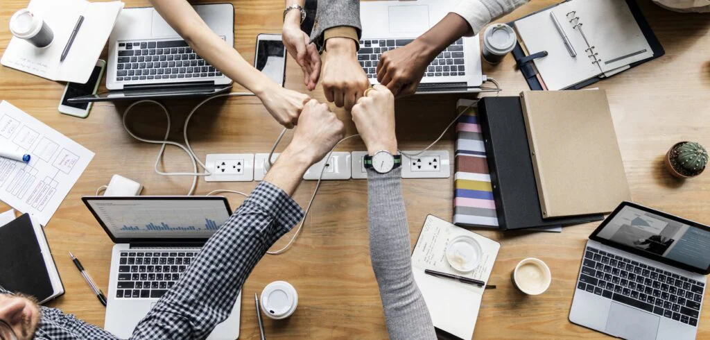 blog a9b4b5a0d744 colleagues giving fist bump min